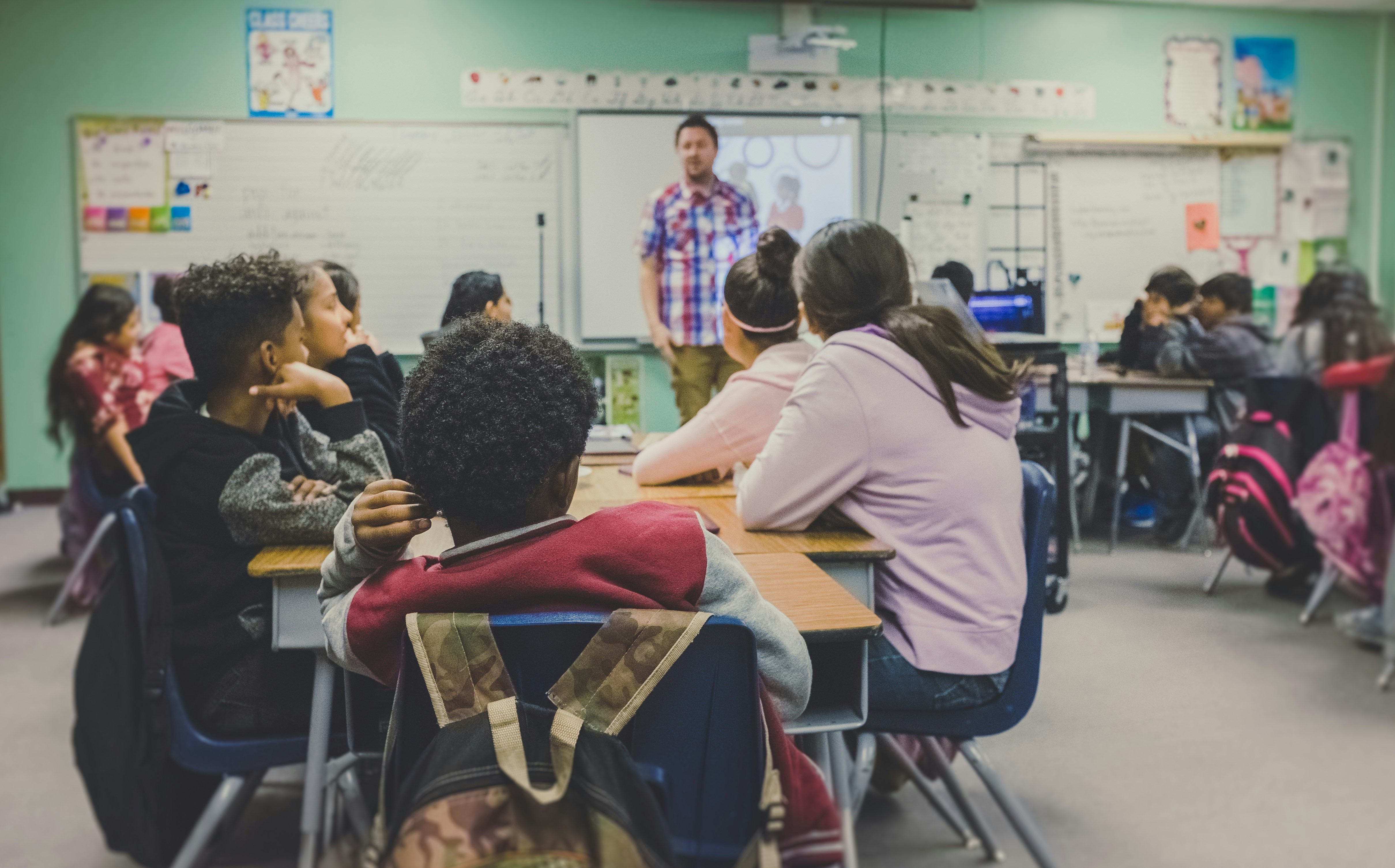 Teacher and pupils in classroom